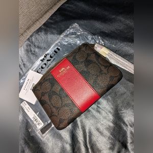Coach signature wristlet